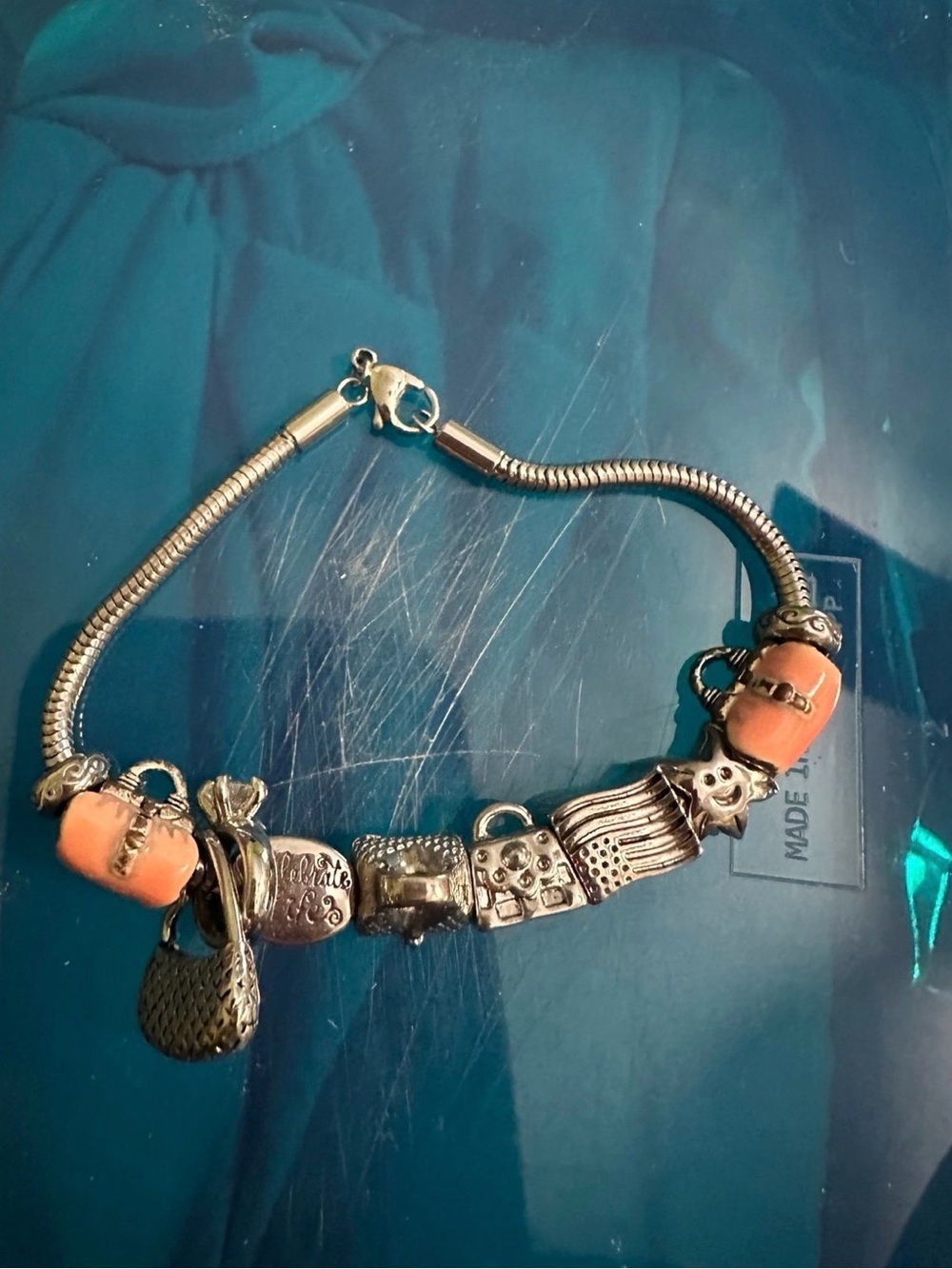 Silver Charm Bracelet with Coral Beads